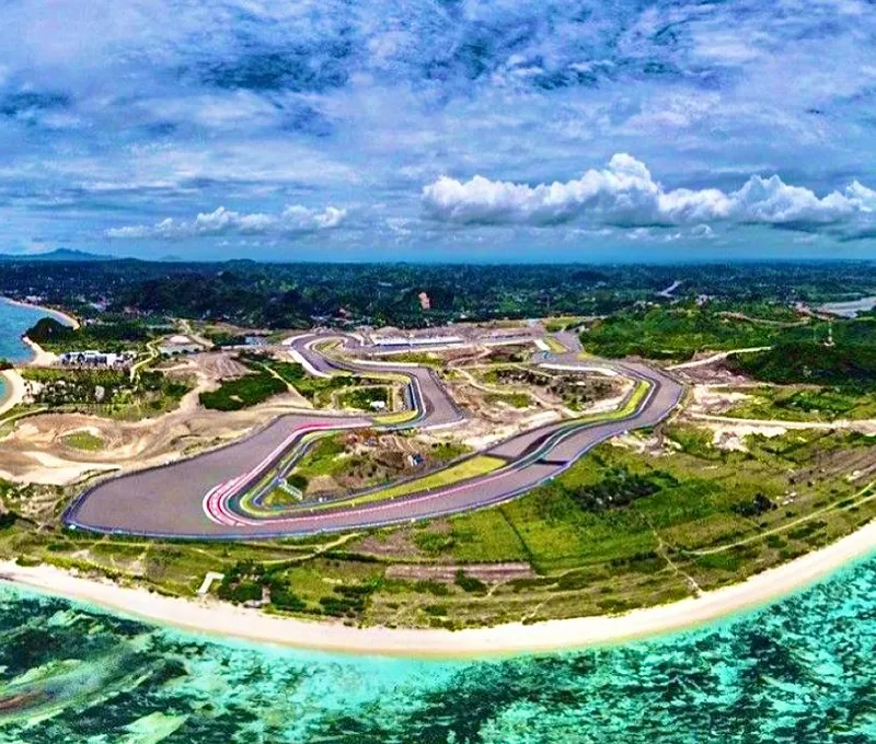 Aerial photo of the Mandalika MotoGP race circuit built beside Lombok’s turquoise coastline.