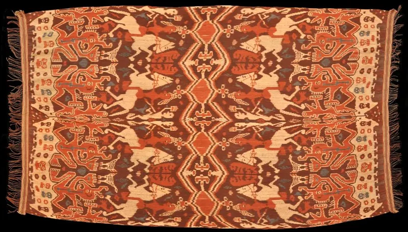 Traditional Sumba hinggi cloth with complex ancestral motifs and symmetrical layout.